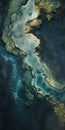 Aerial View Of Organic Sculpted Flooded Landscape In Dark Teal And Light Gold