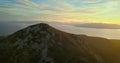 Aerial view of Oros mountain on Aegina island, Greece at beautiful sunset with dramatic sky.