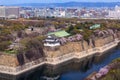 Aerial view of Osaka castle in cherry blossom season, Japan Royalty Free Stock Photo