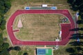 Aerial view of an outdoor athletics arena  with running track Royalty Free Stock Photo