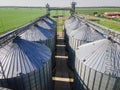 Aerial view over agricultural grain silos