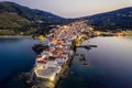 Aerial view over the beautiful illuminated town of Andros island, Greece,