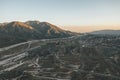 Aerial view over California Country Site Desert Mountains with Highway and Car traffic Royalty Free Stock Photo