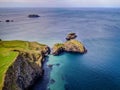 Aerial view over Carrick-A-Rede Rope Bridge in North Ireland Royalty Free Stock Photo