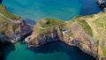 Aerial view over Carrick-A-Rede Rope Bridge in North Ireland Royalty Free Stock Photo