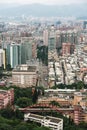 Aerial view over Downtown Taipei with layers of mountain in background in the dusk from Xiangshan Elephant Mountain in the evening Royalty Free Stock Photo