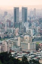 Aerial view over Downtown Taipei with layers of mountain in background in the dusk from Xiangshan Elephant Mountain in the evening Royalty Free Stock Photo