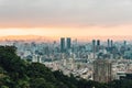 Aerial view over Downtown Taipei with layers of mountain in background in the dusk from Xiangshan Elephant Mountain in the evening Royalty Free Stock Photo