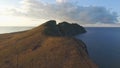 Aerial view over the field and Chilean coastline on cloudy blue sky and sea background. Shot. Amazing landscape Royalty Free Stock Photo