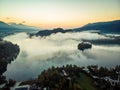 Aerial view over foggy morning at Bled lake, Slovenia Royalty Free Stock Photo