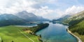 Aerial view over Lake Sils and the Chaste island in Sils Maria, Switzerland