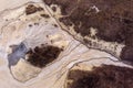 Aerial view over the muddy volcano Paclele Mici and Paclele Mari in Buzau county , natural park in Romania