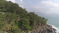 Aerial view over palm trees, rocks and sea in Phuket