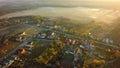 Aerial view over the private houses village in summer sun