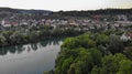 Aerial view over Aare river, the train bridge of Brugg and residential area of Umikenand Riniken, Switzerland