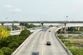 Aerial view of overpass superhighway in countryside of Thailand show light traffic on beautiful summer holiday season.Image use