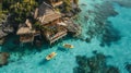 Aerial View of Overwater Bungalows and Kayaks on Tropical Coast at Noon