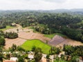 Aerial view of paddy,rice,fields,coconut plams and harvested water bodies,reservoirs from district