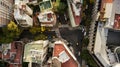 Aerial view of the Palermo district in Buenos Aires, Argentina, main street with autumn trees, colourful cars passing by, differen Royalty Free Stock Photo