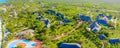 Aerial view of palms on the sandy beach of Indian Ocean at sunny day. Summer holiday in Zanzibar, Africa. Tropical landscape with Royalty Free Stock Photo