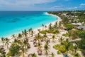 Aerial view of palms on the sandy beach of Indian Ocean at sunset Royalty Free Stock Photo