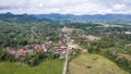 Aerial view of panorama of beautiful countryside of Bukittinggi. wonderful springtime landscape in mountains. grassy field and