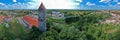 Aerial view on panorama city, old town, water pressure tower, green city.