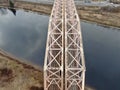 Aerial view panorama of railway bridge over river and high-speed road highway. the picture from the drone Royalty Free Stock Photo