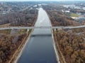 Aerial view panorama of railway bridge over river and high-speed road highway. the picture from the drone Royalty Free Stock Photo