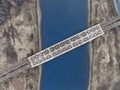 Aerial view panorama of railway bridge over river and high-speed road highway. the picture from the drone Royalty Free Stock Photo