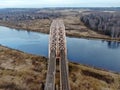 Aerial view panorama of railway bridge over river and high-speed road highway. the picture from the drone Royalty Free Stock Photo