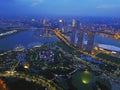 Aerial view panorama of Singapore skyscrapers with city skyline during cloudy summer day. Slightly soft and noise due to high iso Royalty Free Stock Photo