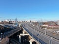 Aerial view panorama on the sunny day of the city landscape of the road highway in the Moscow district of Hovrino. Shot from drone Royalty Free Stock Photo