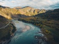 Aerial view of panoramic autumn mountain landscape with river. Drone shot Royalty Free Stock Photo