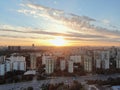 Aerial view panoramic landscape of Moscow city at sunrise. Modern houses in the rays of the golden sun. Drone shot