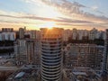 Aerial view panoramic landscape of Moscow city at sunrise. Modern houses in the rays of the golden sun. Drone shot