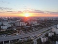 Aerial view panoramic landscape of Moscow city at sunrise. Modern houses in the rays of the golden sun. Drone shot