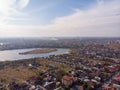 Aerial view of Pantelimon city , Dobroesti lake and Dobroesti island. Autumn 2021.Romania Royalty Free Stock Photo