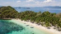 Aerial view of a paradisiacal island with some traditional filipino boats in Palawan, The Philippines Royalty Free Stock Photo