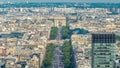 Aerial view of Paris and The Arc de Triomphe with Champs Elysees timelapse from the top of the skyscrapers in Paris Royalty Free Stock Photo