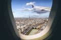 Aerial view Paris cityscape through airplane window while approaching to airport Royalty Free Stock Photo