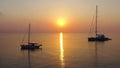 Aerial view of parked sailboat in the early morning sunrise