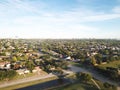 Aerial view parkside residential neighborhood with midtown Dallas skylines in background near Carrollton, Texas, America