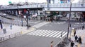 Aerial View Pedestrians Crossing Crosswalk Cars Traffic in Japan