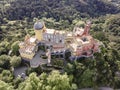 Aerial view of Pena Palace, a colourful Romanticist castle building on hilltop during a beautiful sunset, Sintra, Lisbon, Portugal Royalty Free Stock Photo