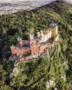 Aerial view of Pena Palace, a colourful Romanticist castle building on hilltop during a beautiful sunset, Sintra, Lisbon, Portugal Royalty Free Stock Photo