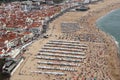 Aerial view of people at NazarÃ© Beach, Portugal