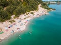 aerial view of people swimming sunbathing resting at sandy beach Royalty Free Stock Photo