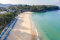 Aerial view of people swimming in the transparent turquoise sea at Karon beach in Phuket, Thailand Royalty Free Stock Photo