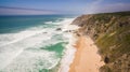 Aerial view of peoples resting on Praia da Adraga beach in Portugal, Almocageme, Sintra